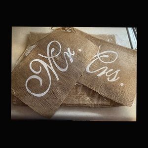MR & Mrs signs with a table runner.